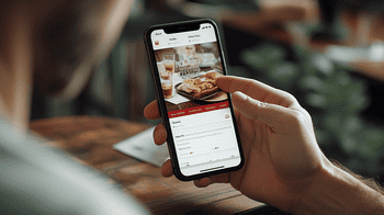 1_reading_reviews_on_phone_4